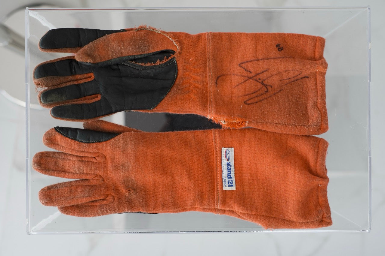 1984 Ayrton Senna Stand 21 used gloves signed