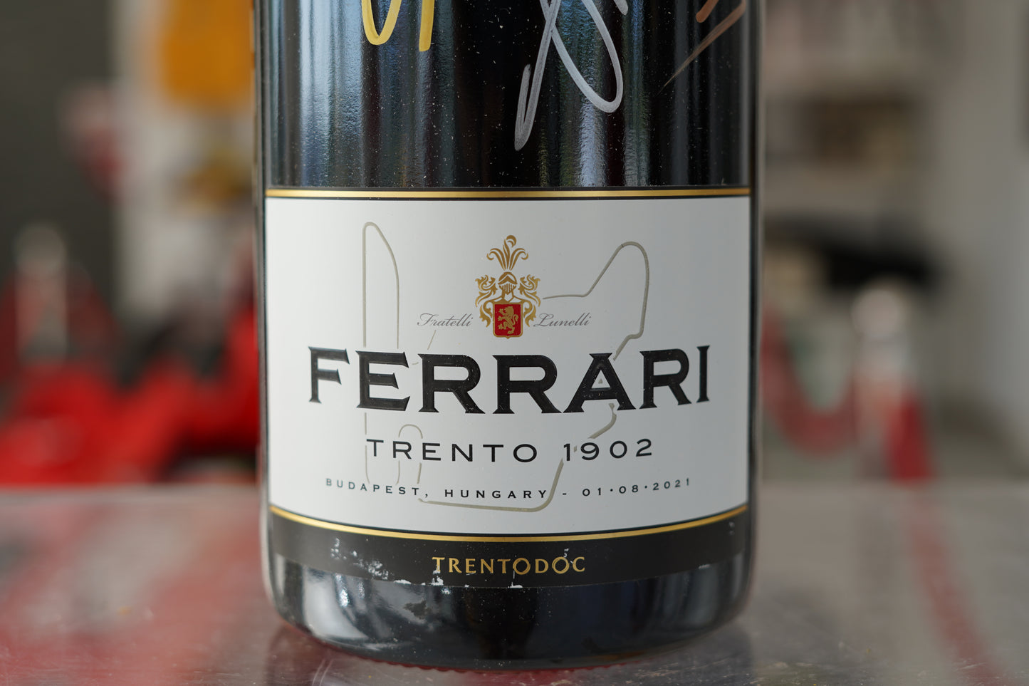 2021 Hungaria GP Official Ferrari Trento Podium Bottle Signed by Ocon, Hamilton and Sainz