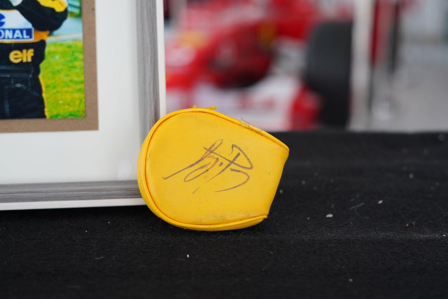 1985 Ayrton Senna personal Camel sunglasses with signed glass holder